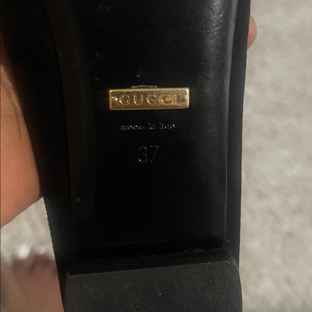 Gucci Black Leather Flats with Gold Buckle